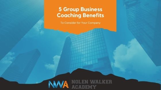 Group Business Coaching Blog Cover for 5 Group Business Coaching Benefits Showing Tall Building
