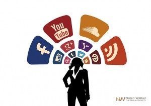 a silhouette of a businesswoman with social media icons above her head