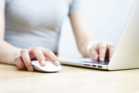 Woman Using on Computer Using PPC Analysis Tools